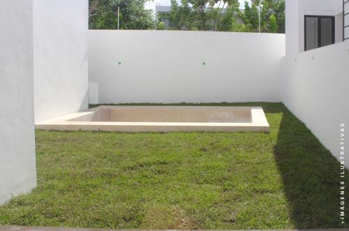 1020-47684-Residencias-en-Privada-en-Cholul-con-diseno-de-sala-y-comedor-a-doble-altura_(8).jpg