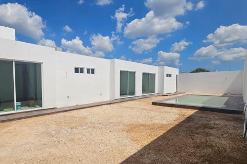 1426-40548-Casa-de-una-planta-con-alberca-en-venta-en-Dzitya-Merida-17.jpg