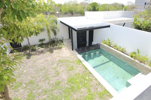 1561-48126-Casa-en-venta-en-Temozon-Norte-Merida-Casa-ARENNA-de-3-recamaras-6-banos-Alberca_(15).jpg