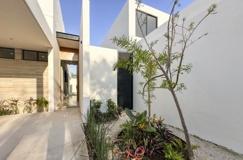1697-48576-Casa-en-venta-en-Viladiu-Cholul-con-alberca-y-cocina-integral_(9).jpg