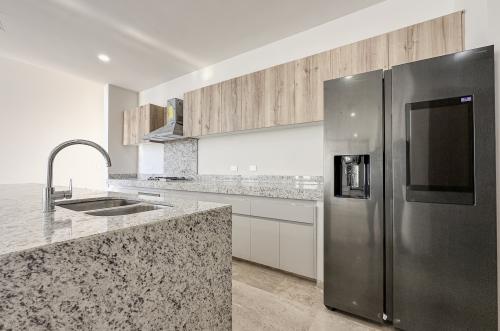 1697-48583-Casa-en-venta-en-Viladiu-Cholul-con-alberca-y-cocina-integral_(15).jpg