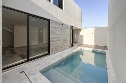 1697-48593-Casa-en-venta-en-Viladiu-Cholul-con-alberca-y-cocina-integral_(25).jpg