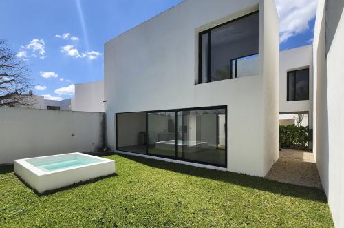 1718-48511-Casa-en-venta-en-Cholul-Merida-Oasis-residencial-3-habitaciones-y-alberca_(21).jpg