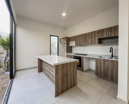 1806-52757-Casa-en-venta-de-un-piso-con-2-habitaciones-y-alberca-en-Naia-Residencial-Conkal_(13).jpg