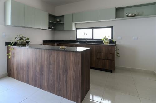 1817-50028-Casa-en-venta-en-Merida-Conkal-de-2-plantas-con-2-recamaras_(11).jpg