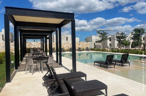 1821-50088-1699-47024-Casa-en-venta-en-Merida-Conkal-Aldoria-de-una-planta-en-privada-residencial_(2).jpg