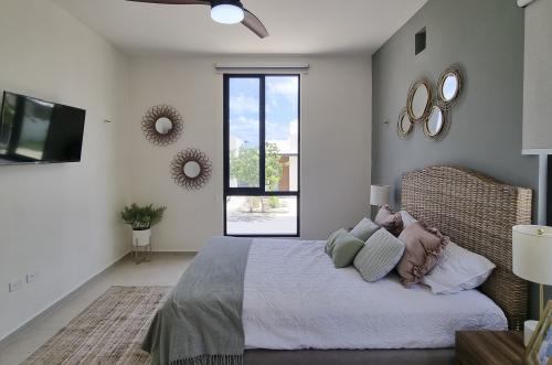 1828-50285-Casa-en-Venta-en-Bosques-de-Cholul-con-3-Habitaciones-y-Alberca_(9).jpg