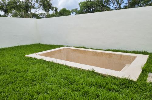 1828-50297-Casa-en-Venta-en-Bosques-de-Cholul-con-3-Habitaciones-y-Alberca_(20).jpg