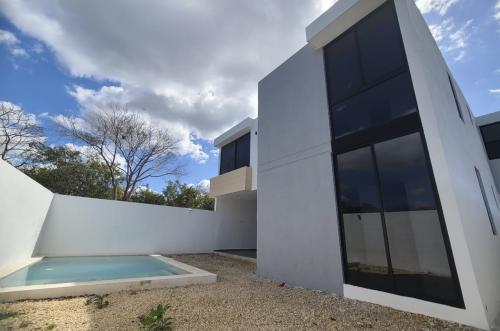 1835-50472-Casa-en-Venta-en-Temozon-Norte-Merida-de-4-recamaras-1-recamara-en-planta-baja_(13).jpg
