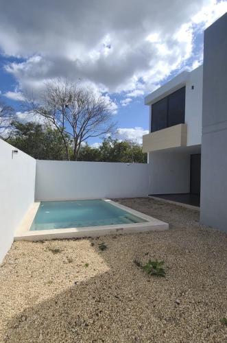 1835-50474-Casa-en-Venta-en-Temozon-Norte-Merida-de-4-recamaras-1-recamara-en-planta-baja_(14).jpg