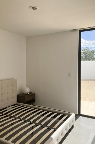 1841-50799-Casa-en-venta-en-Cholul-dentro-de-Privada-Residencial-con-paneles-solares_(11).jpg
