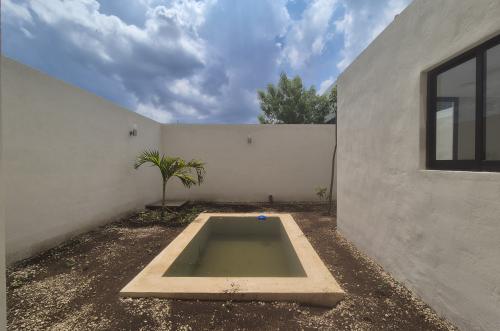 1859-51002-Casa-en-Venta-en-Gran-San-Pedro-Cholul-con-habitacion-en-planta-baja-y-alberca_(25).jpg