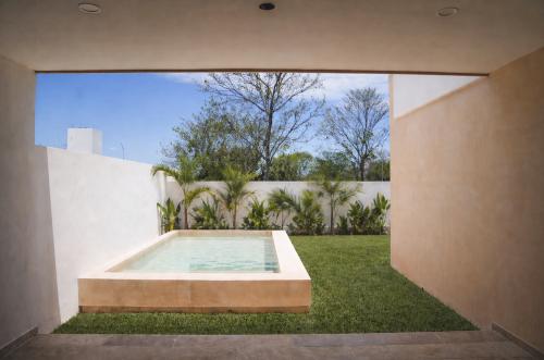 1902-52996-Casa-Alaia-en-Venta-dentro-privada-zona-conkal-Merida-con-tres-recamaras_(32).jpg