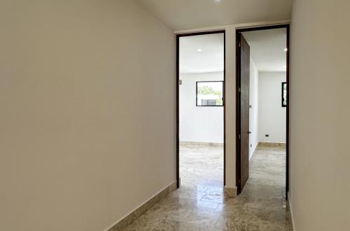 2013-54455-Casa-en-venta-en-privada-Nuukul-Temozon-Norte-con-electrodomesticos-incluidos_(23).jpg