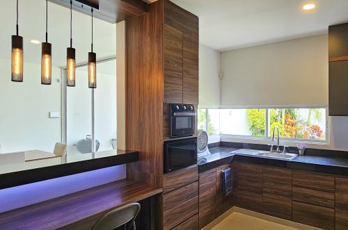 2028-54836-Casa-en-Venta-Dzityá-Mérida-con-super-Cocina-Jardín-y-Alberca_(12).jpg
