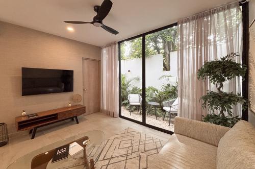 2029-54787-Casa_estilo-Townhouse-en-venta-en-cholul-al-norte-de-Merida-THULA-CITY-HOME__(5).jpg