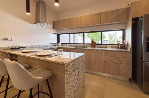 2029-54795-Casa_estilo-Townhouse-en-venta-en-cholul-al-norte-de-Merida-THULA-CITY-HOME__(14).jpg