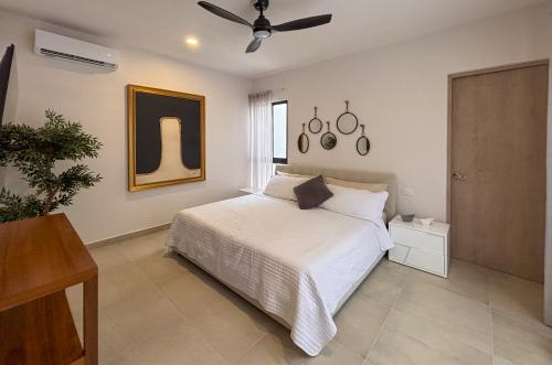 2029-54798-Casa_estilo-Townhouse-en-venta-en-cholul-al-norte-de-Merida-THULA-CITY-HOME__(17).jpg