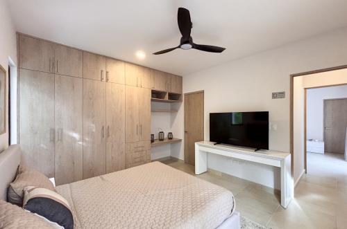 2029-54807-Casa_estilo-Townhouse-en-venta-en-cholul-al-norte-de-Merida-THULA-CITY-HOME__(26).jpg