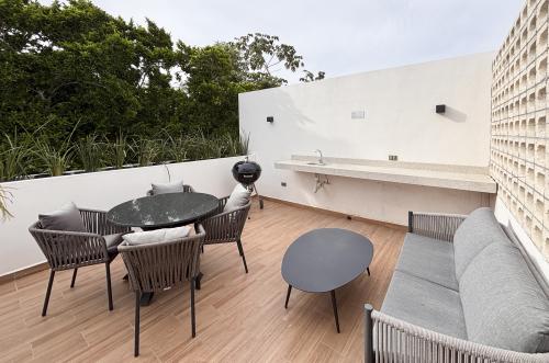 2029-54814-Casa_estilo-Townhouse-en-venta-en-cholul-al-norte-de-Merida-THULA-CITY-HOME__(33).jpg