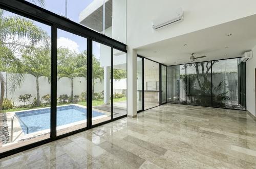 832-49459-Casa-en-venta-en-Compostela-Merida-de-4-habitaciones-con-un-increible-diseno_(1).jpg