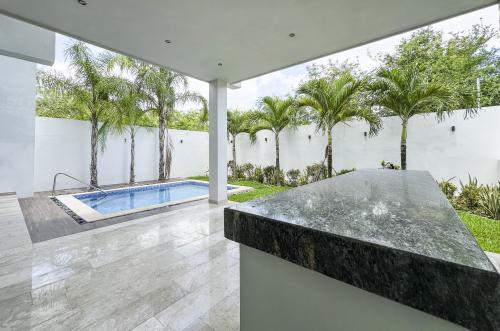 832-49490-Casa-en-venta-en-Compostela-Merida-de-4-habitaciones-con-un-increible-diseno_(32).jpg